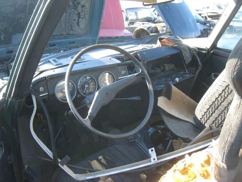 Illustration for article titled 1969 Saab 99 Surrounded By Jaguars On Death Row